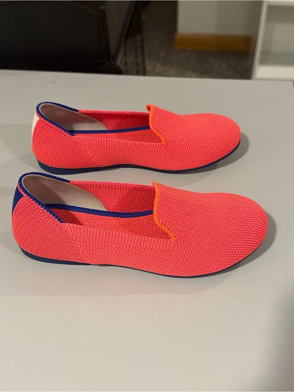 Rothy's Kids Coral-Pink Knit Slip-On Flats with Navy Trim